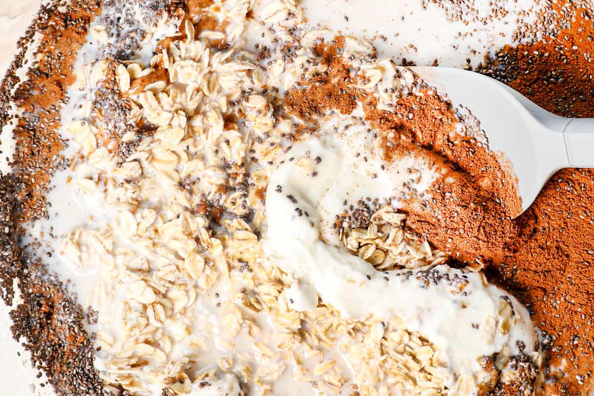 showing how to make overnight oats by mixing the ingredients together