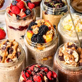 showing how to make overnight oats by diving the mixture into jars and topping nine different ways