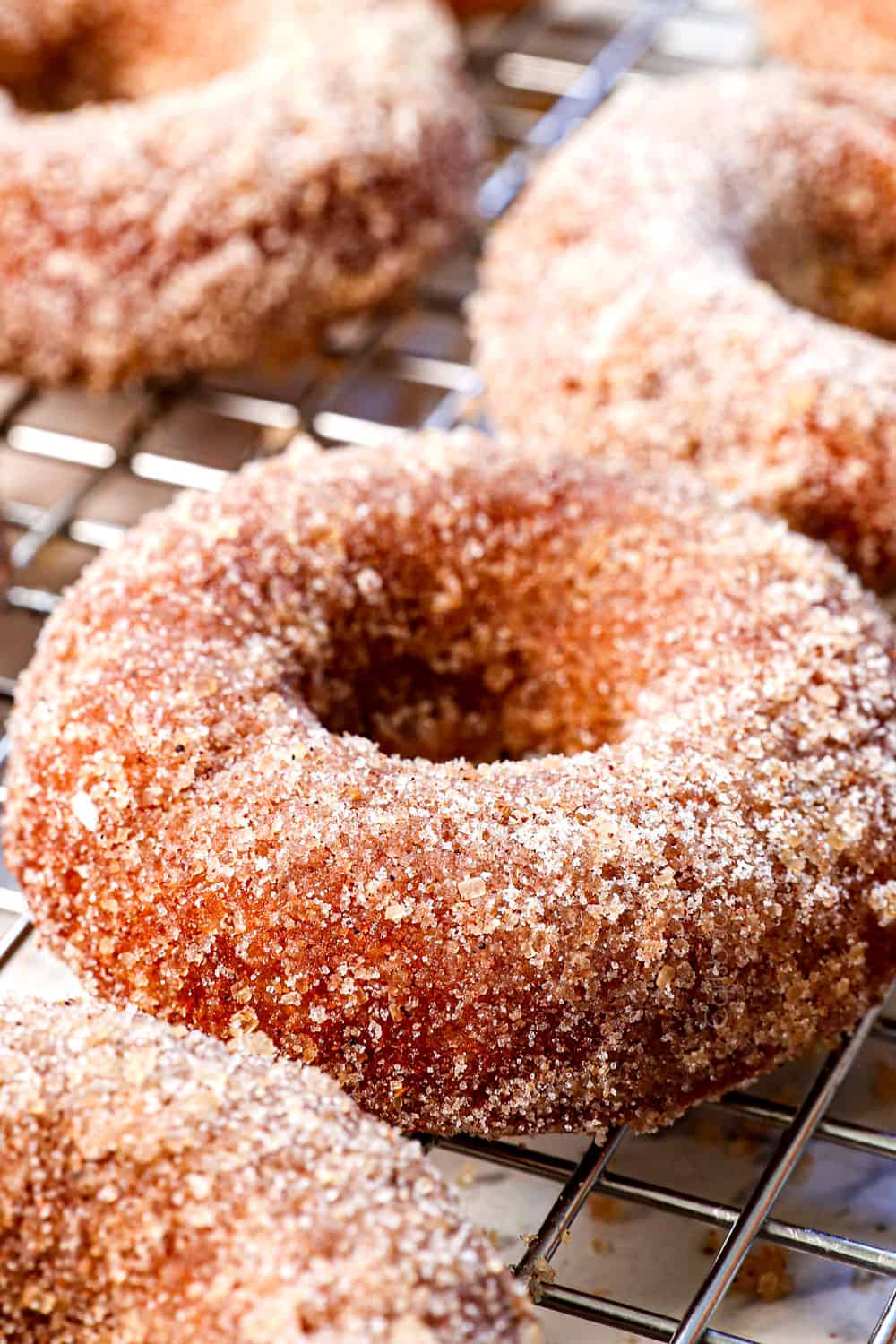 up close of apple cider donut showing the thickness and texture