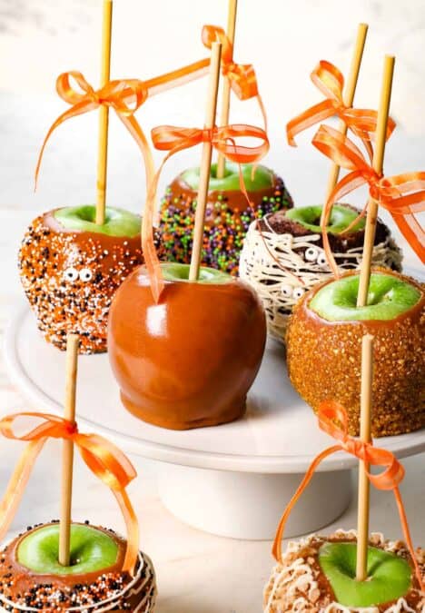 Caramel Apples on a display stand showing the variety of ways to decorate with toppings