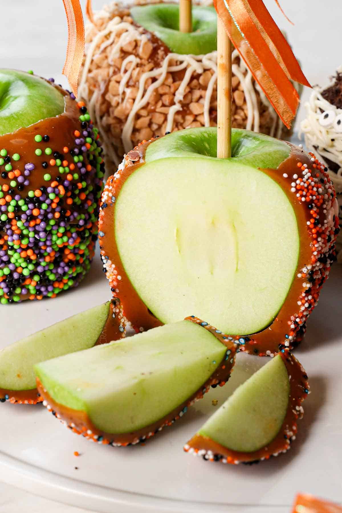 showing how to serve a caramel apple by cutting into slices