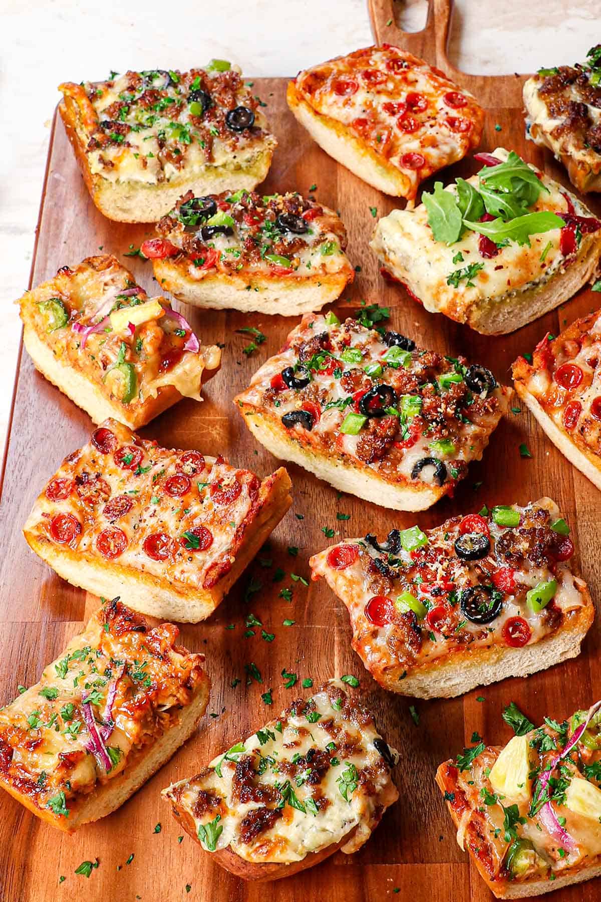 french bread pizza recipe with 3 different variations cut on a cutting board
