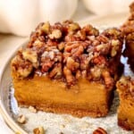 up close of pumpkin bar on a plate showing how creamy it is