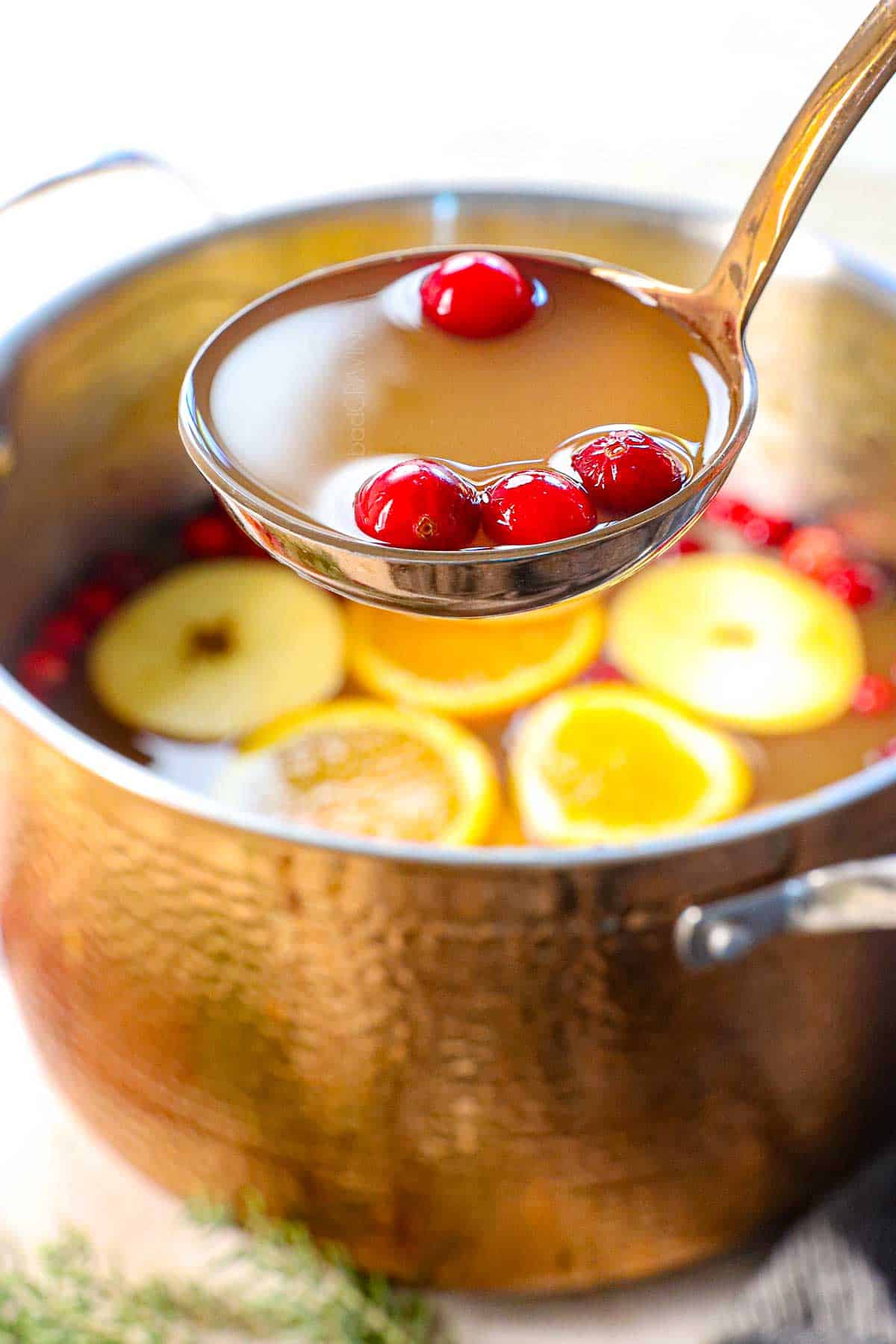 a ladle of wassail drink