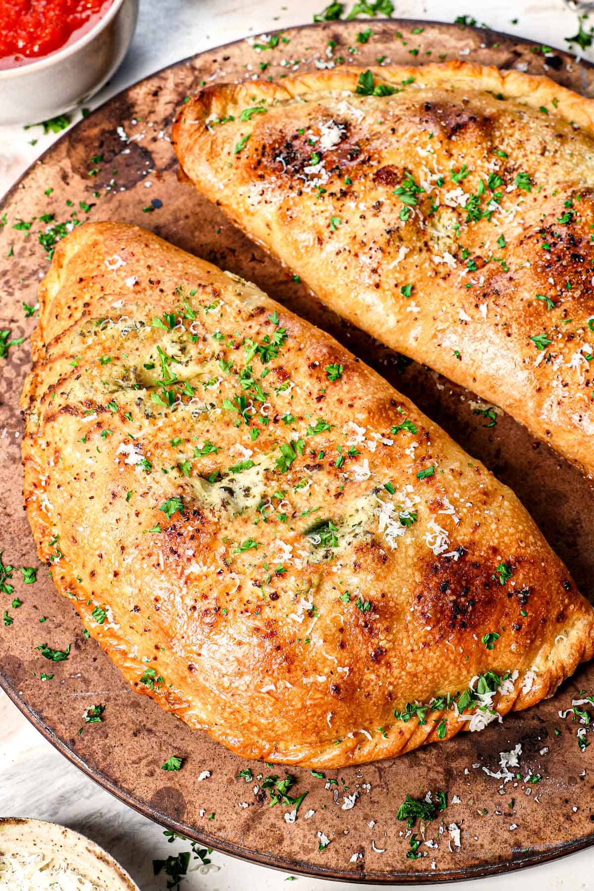 showing how to make a calzone by baking until golden