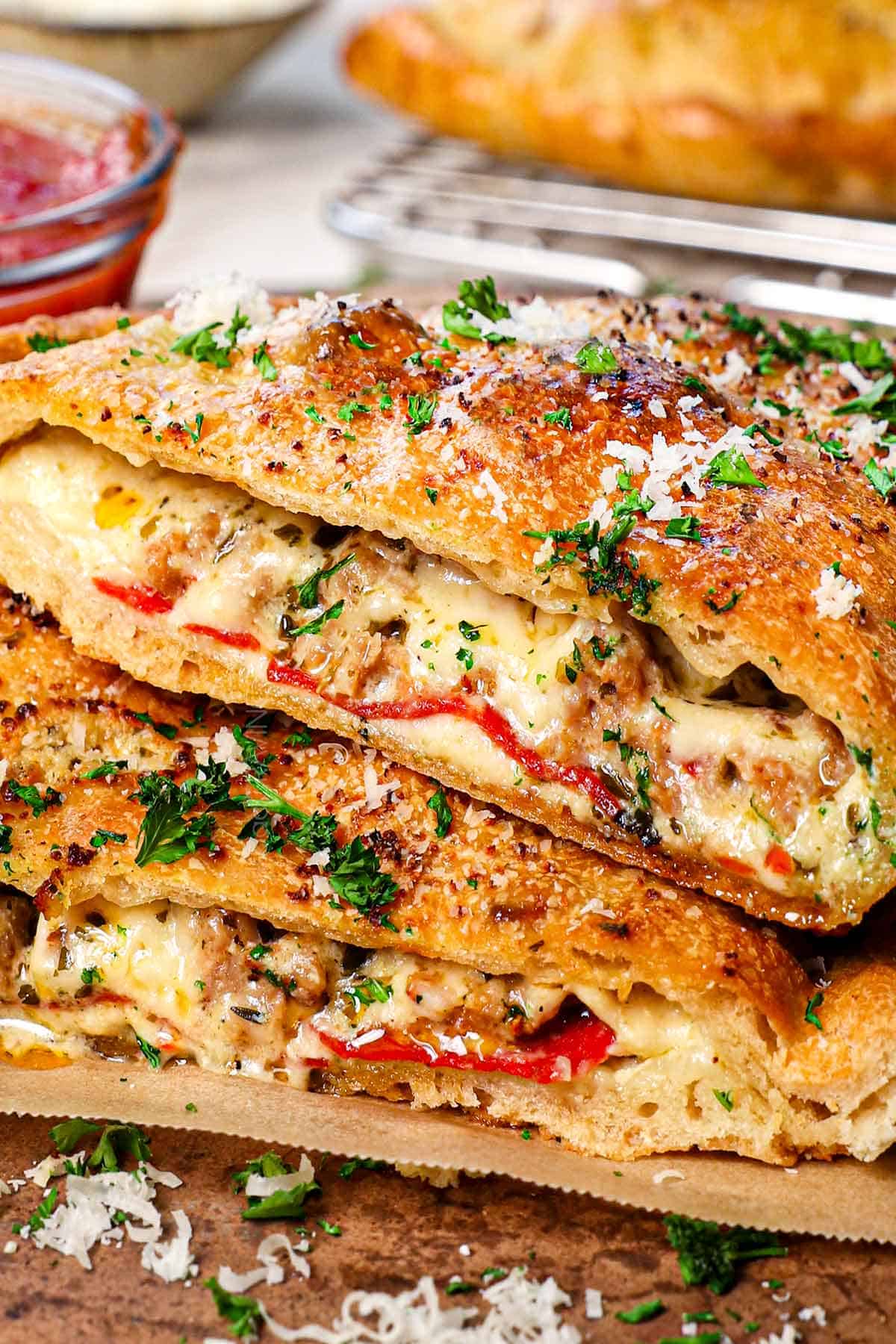 up close of calzones showing the cheesy filling