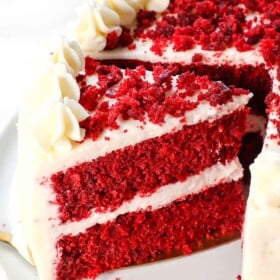 best red velvet cake recipe with a slice cut out
