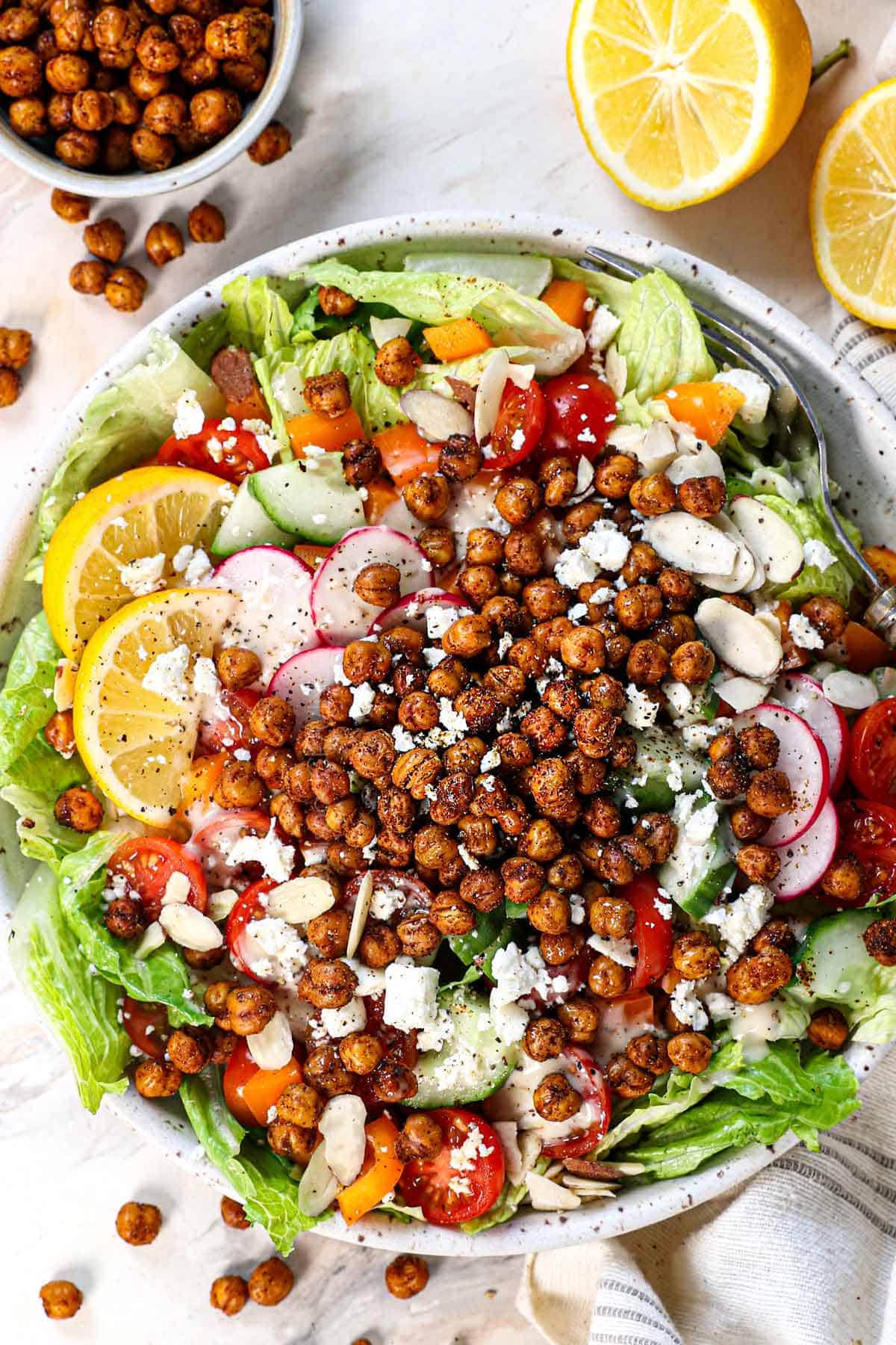 showing how to serve roasted chickpeas in oven in a a salad