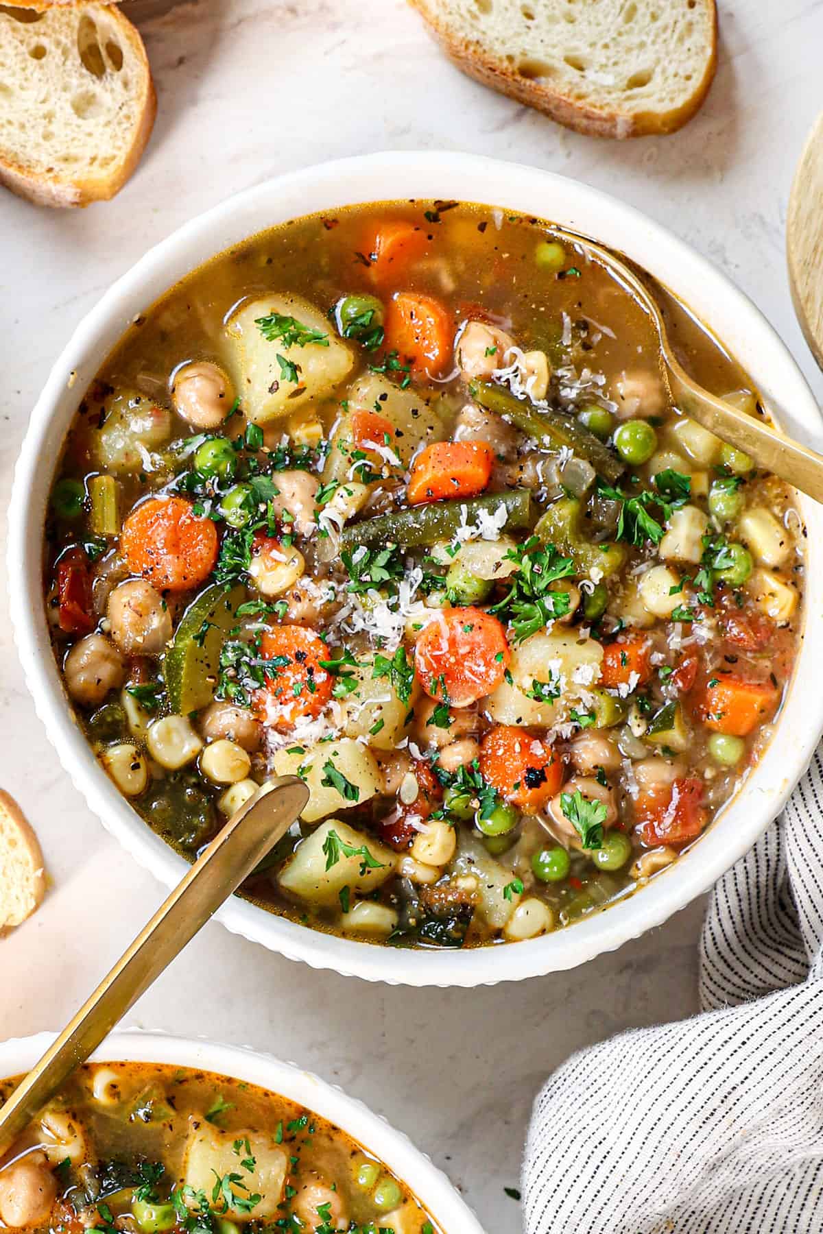 top view of homemade vegetable soup being served in a bowl