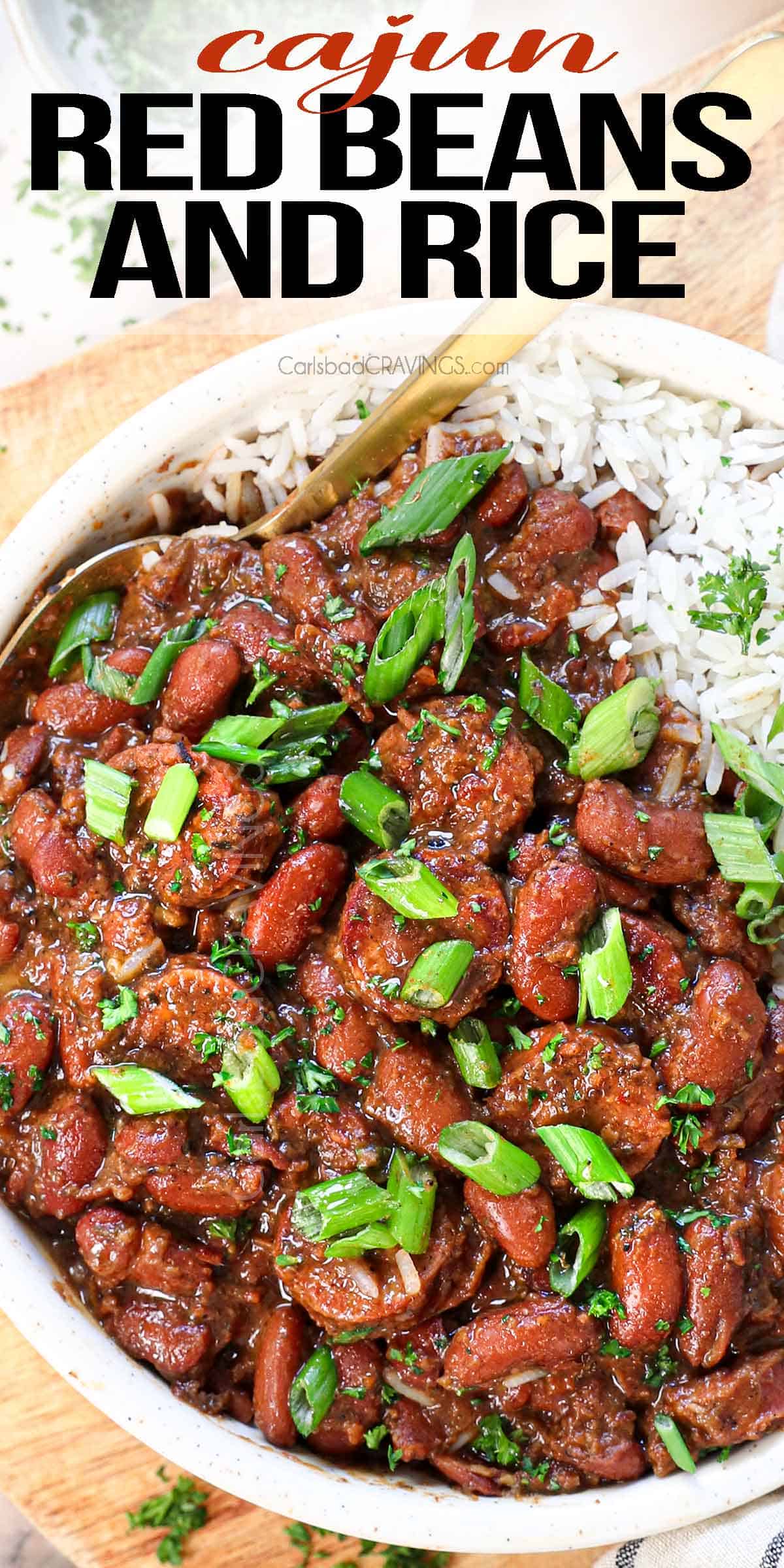 top view of red beans and rice being served in a bowl garnished with parsley and green onions