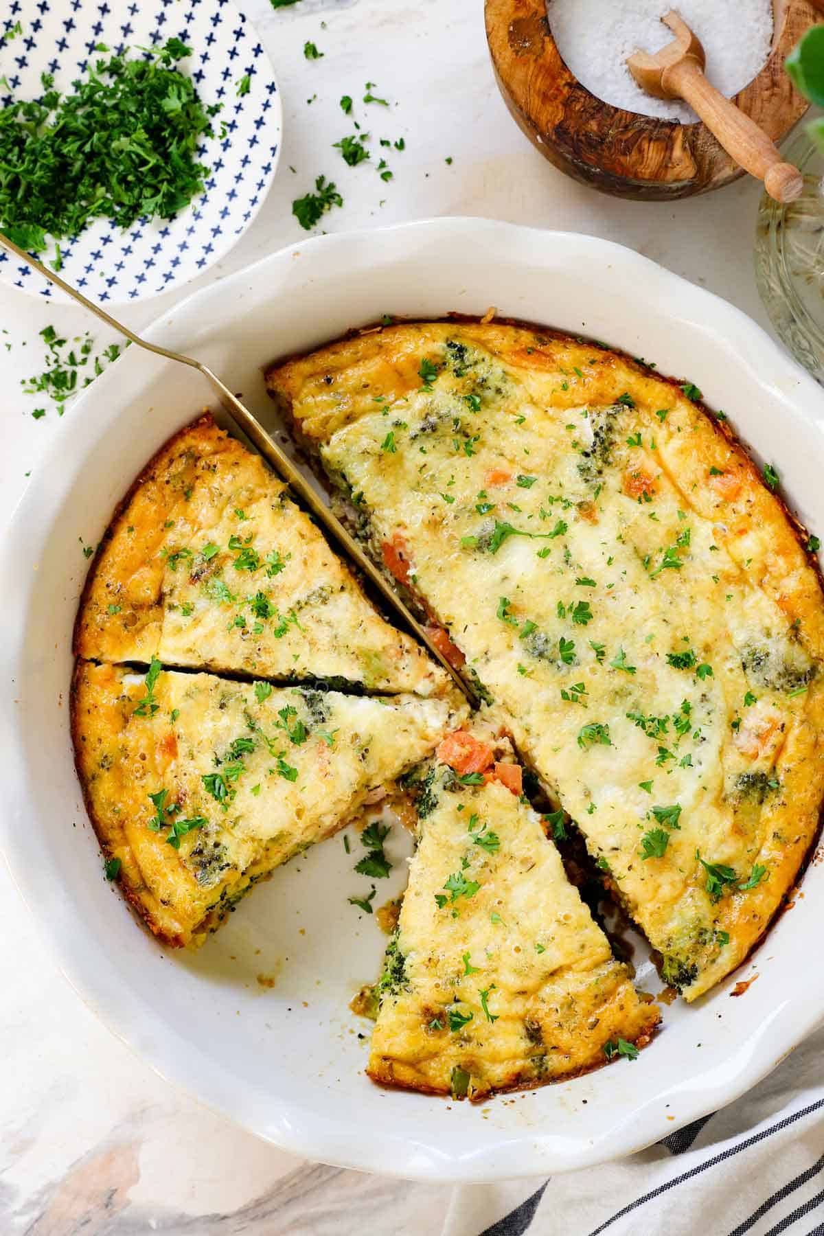 top view of recipe for crustless quiche showing it in a 9-inch pie pan