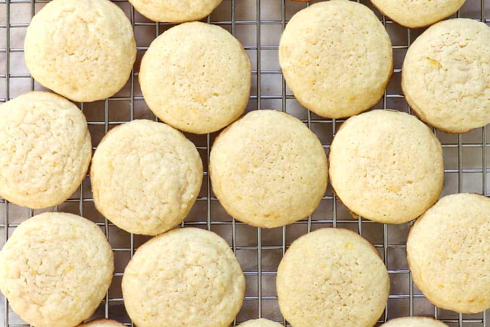showing how to make lemon cookies by baking, then chilling on a wire rack