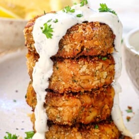 showing how to serve fried salmon croquettes by serving with dip