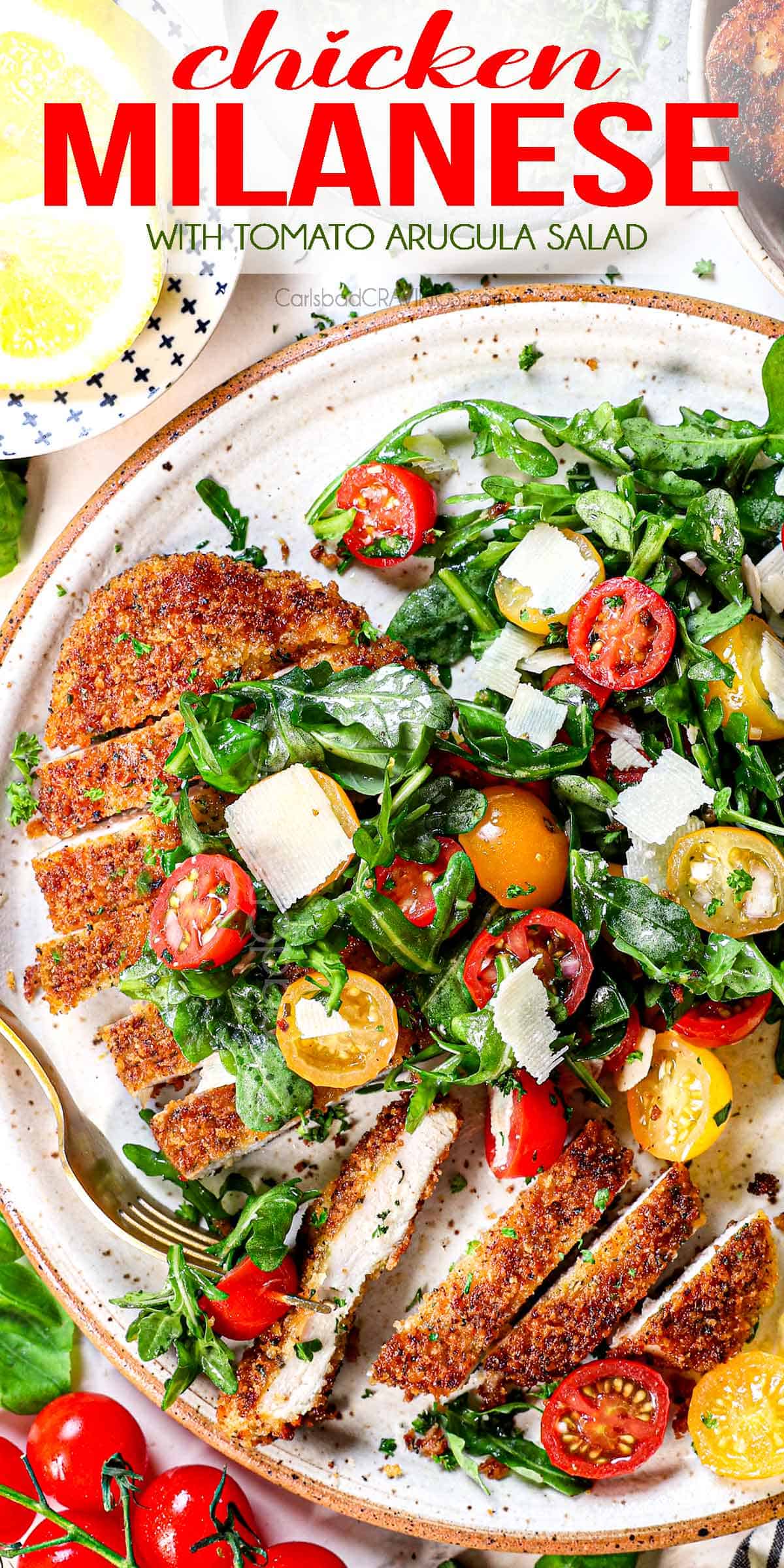 top view of chicken Milanese topped with arugula salad