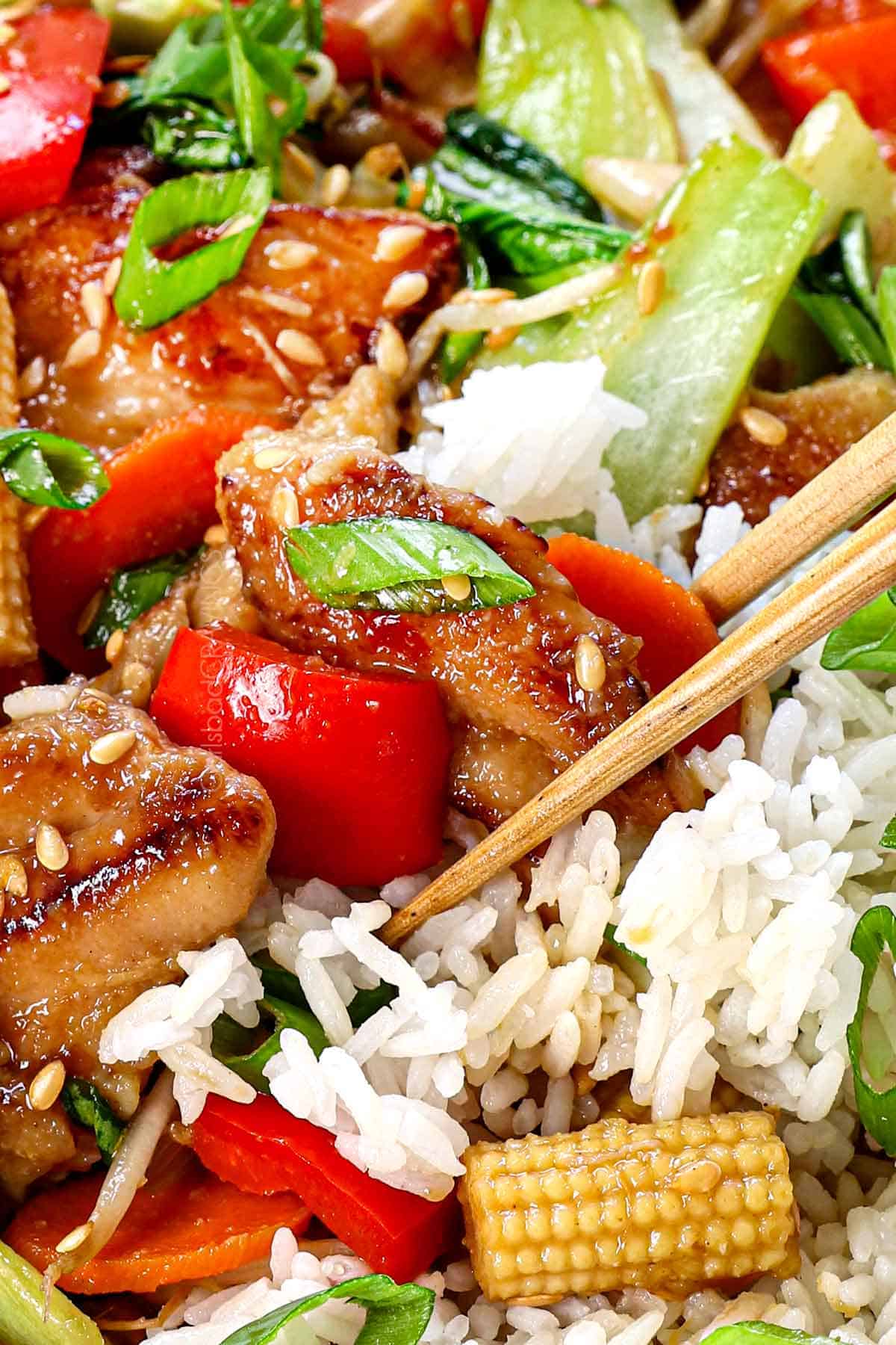 up close of how to eat chop suey with chopsticks